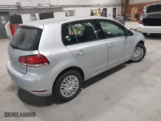 2010 Volkswagen Golf with VIN WVWDB7AJ9AW380191, listed as a IAAI auction lot 41649536 with 117,295 mi miles. Bid and sale history available at carsss.com. Image 4.