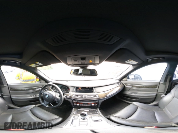 2015 BMW 7 Series 740i with VIN WBAYA6C54FG273188, listed as a IAAI auction lot 42563572 with 70,675 mi miles and . Bid and sale history available at DreamBid. Image 19.