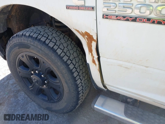 2016 Ram 2500 SLT with VIN 3C6UR5DLXGG209185, listed as a IAAI auction lot 41814628 with 298,573 mi miles. Bid and sale history available at carsss.com. Image 6.