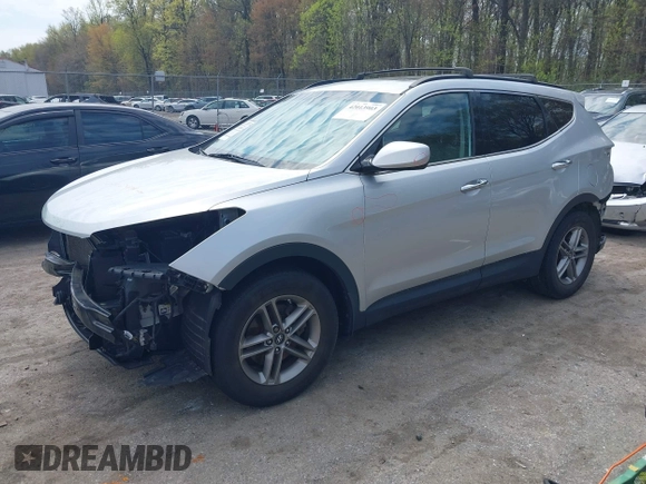 2017 Hyundai Santa Fe 2.4L z VIN 5XYZUDLB6HG400828, wystawiony jako IAAI lot #42013903 z przebiegiem 88 573 mil mil oraz . Historia ofert i sprzedaży dostępna na DreamBid. Obrazek 2.