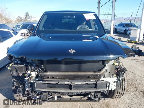 2025 Rivian R1S Adventure z VIN 7PDSGBBA4SN047584, wystawiony jako IAAI lot #41372645 z przebiegiem 501 mil mil oraz . Historia ofert i sprzedaży dostępna na DreamBid. Obrazek 13.