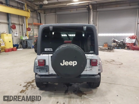 2003 Jeep Wrangler Rubicon with VIN 1J4FA69S13P375142, listed as a IAAI auction lot 41709647 with 125,443 mi miles and . Bid and sale history available at DreamBid. Image 17.