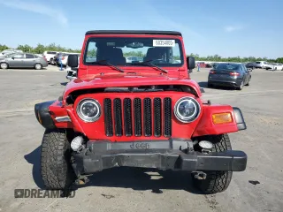2003 Jeep Wrangler Sport z VIN 1J4FA49S33P302780, wystawiony jako Copart lot #60354805 z przebiegiem 201 679 mil mil oraz Szkoda całkowita • Salvage title. Historia ofert i sprzedaży dostępna na DreamBid. Obrazek 5.