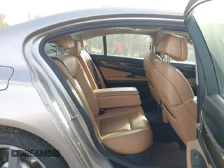 2012 BMW 7 Series 740i with VIN WBAKA4C58CDS99381, listed as a IAAI auction lot 41655715 with 112,731 mi miles and . Bid and sale history available at DreamBid. Image 8.