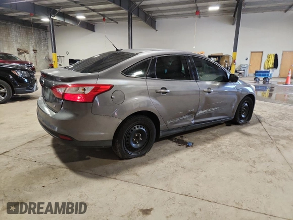 2012 Ford Focus SE with VIN 1FAHP3F28CL208855, listed as a Copart auction lot 63766165 with 168,183 mi miles and Salvage title. Bid and sale history available at DreamBid. Image 3.