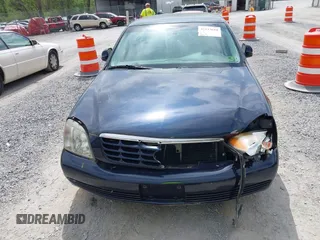 2004 Cadillac DeVille DHS z VIN 1G6KE54Y64U110060, wystawiony jako IAAI lot #42133610 z przebiegiem 68 677 mil mil oraz . Historia ofert i sprzedaży dostępna na DreamBid. Obrazek 6.