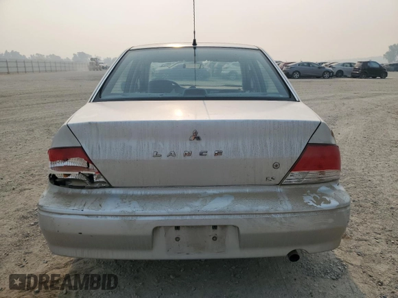 2002 Mitsubishi Lancer ES with VIN JA3AJ26E22U045919, listed as a Copart auction lot 63852225 with 184,071 mi miles and Salvage title. Bid and sale history available at DreamBid. Image 6.