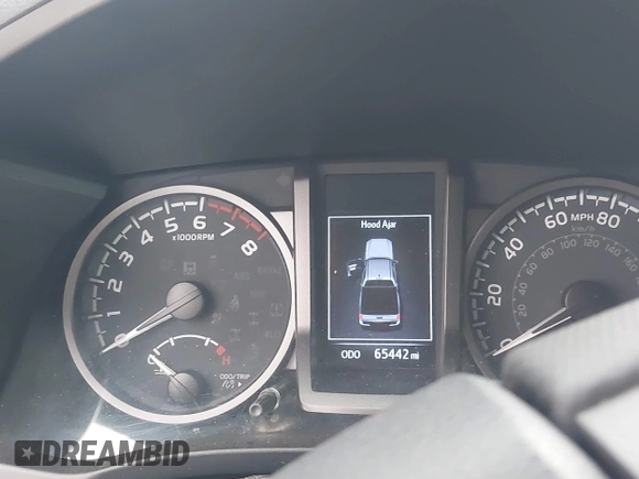 2020 Toyota Tacoma SR5 z VIN 5TFCZ5AN5LX242708, wystawiony jako IAAI lot #42356772 z przebiegiem 65 442 mil mil oraz . Historia ofert i sprzedaży dostępna na DreamBid. Obrazek 7.