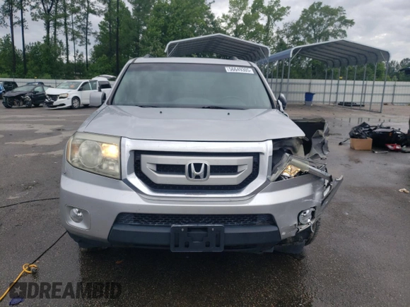 2011 Honda Pilot EX-L with VIN 5FNYF3H71BB033923, listed as a Copart auction lot 56649305 with 132,304 mi miles and Salvage title. Bid and sale history available at DreamBid. Image 5.