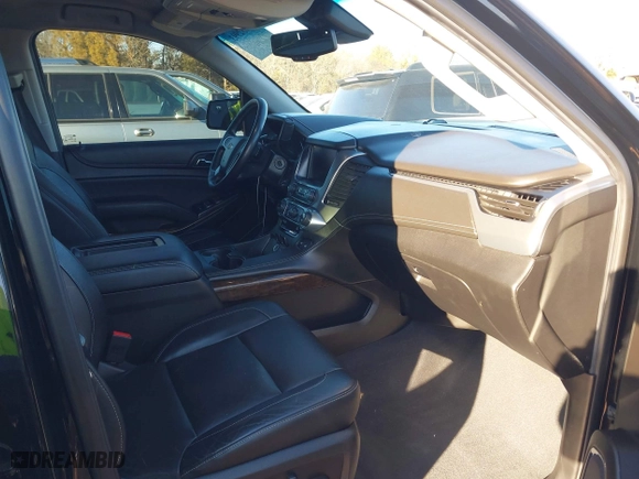 2019 Chevrolet Tahoe LT with VIN 1GNSKBKC2KR365355, listed as a IAAI auction lot 41032993 with 250,419 mi miles. Bid and sale history available at carsss.com. Image 5.