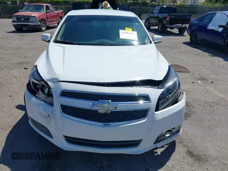 2013 Chevrolet Malibu LT with VIN 1G11C5SA1DF228146, listed as a IAAI auction lot 41904296 with 118,541 mi miles and . Bid and sale history available at DreamBid. Image 12.