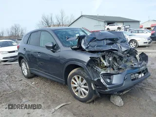 2014 Mazda CX-5 Touring with VIN JM3KE4CY6E0387767, listed as a IAAI auction lot 41698128 with 1 mi miles. Bid and sale history available at carsss.com. Image 1.