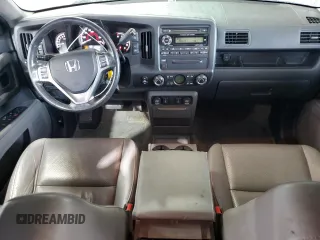 2010 Honda Ridgeline RTL z VIN 5FPYK1F53AB006195, wystawiony jako Copart lot #52528435 z przebiegiem 205 522 mil mil oraz Szkoda całkowita • Salvage title. Historia ofert i sprzedaży dostępna na DreamBid. Obrazek 8.