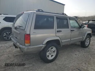 2001 Jeep Cherokee Sport z VIN 1J4FF58SX1L576572, wystawiony jako Copart lot #48982965 z przebiegiem 174 500 mil mil oraz Szkoda całkowita • Salvage title. Historia ofert i sprzedaży dostępna na DreamBid. Obrazek 3.