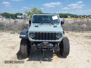 2024 Jeep Wrangler Rubicon with VIN 1C4PJXFG3RW295565, listed as a IAAI auction lot 42026211 with 5,661 mi miles. Bid and sale history available at carsss.com. Image 13.