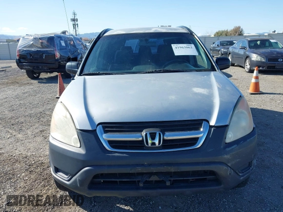 2002 Honda CR-V LX with VIN JHLRD68432C019992, listed as a IAAI auction lot 41963062 with 154,917 mi miles and . Bid and sale history available at carsss.com. Image 6.