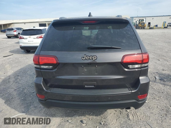 2016 Jeep Grand Cherokee 75th Anniversary with VIN 1C4RJEAG1GC506443, listed as a Copart auction lot 59874015 with 135,714 mi miles and Salvage title. Bid and sale history available at DreamBid. Image 6.