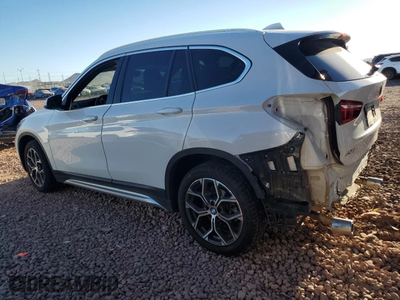 2021 BMW X1 xDrive28i with VIN WBXJG9C08M5U21413, listed as a Copart auction lot 49733935 with 44,220 mi miles and Salvage Title. Bid and sale history available at carsss.com. Image 2.