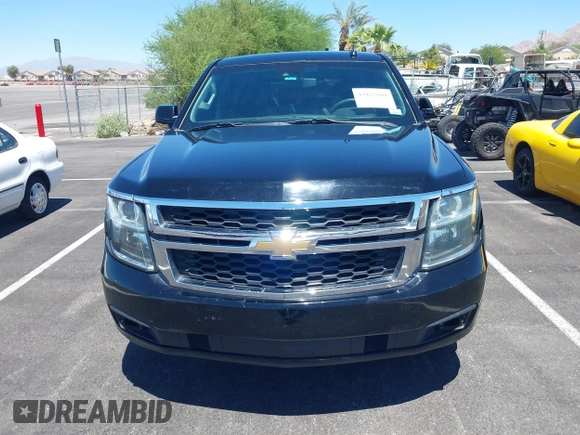 2015 Chevrolet Tahoe Commercial z VIN 1GNLC2EC0FR629983, wystawiony jako IAAI lot #42825604 z przebiegiem 112 410 mil mil oraz . Historia ofert i sprzedaży dostępna na DreamBid. Obrazek 6.