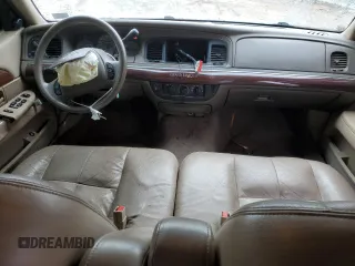 2003 Mercury Grand Marquis GS Convenience z VIN 2MEFM74W53X702387, wystawiony jako Copart lot #52852475 z przebiegiem 246 543 mil mil oraz Szkoda całkowita • Salvage title. Historia ofert i sprzedaży dostępna na DreamBid. Obrazek 8.
