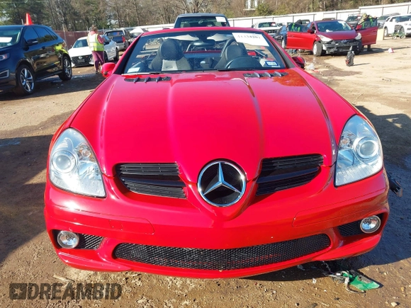 2007 Mercedes-Benz SLK 55 AMG with VIN WDBWK73F07F150189, listed as a IAAI auction lot 41334201 with 70,634 mi miles and . Bid and sale history available at DreamBid. Image 12.