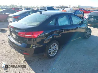 2018 Ford Focus SE with VIN 1FADP3F25JL222689, listed as a IAAI auction lot 42208219 with 127,875 mi miles and . Bid and sale history available at DreamBid. Image 4.