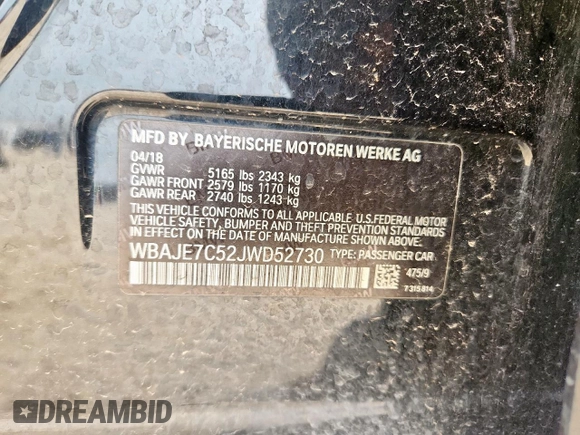 2018 BMW 5 Series 540i xDrive with VIN WBAJE7C52JWD52730, listed as a Copart auction lot 60297425 with 104,208 mi miles and Salvage title. Bid and sale history available at DreamBid. Image 13.