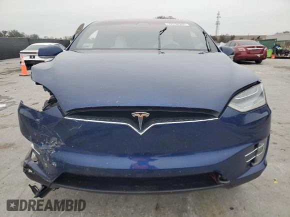 2020 Tesla Model X Long Range with VIN 5YJXCBE2XLF250234, listed as a Copart auction lot 42236365 with 63,401 mi miles and Non Repairable. Bid and sale history available at carsss.com. Image 5.