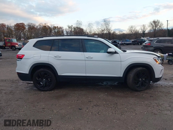 2022 Volkswagen Atlas SE z VIN 1V2KR2CA1NC555087, wystawiony jako IAAI lot #40921013 z przebiegiem 62 834 mil mil oraz . Historia ofert i sprzedaży dostępna na DreamBid. Obrazek 13.