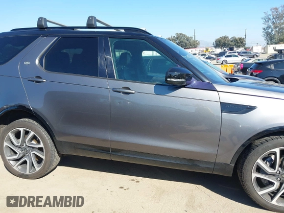 2018 Land Rover Discovery HSE Luxury z VIN SALRT2RV4JA049800, wystawiony jako IAAI lot #41637444 z przebiegiem 57 452 mil mil oraz . Historia ofert i sprzedaży dostępna na DreamBid. Obrazek 13.