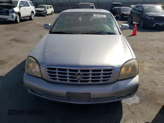 2004 Cadillac DeVille DTS z VIN 1G6KF57994U203706, wystawiony jako Copart lot #76278324 z przebiegiem 203 709 mil mil oraz Szkoda całkowita • Salvage title. Historia ofert i sprzedaży dostępna na DreamBid. Obrazek 5.