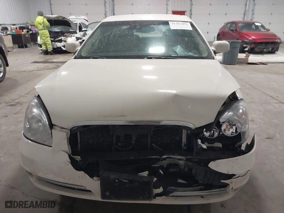 2011 Buick Lucerne CXL Premium with VIN 1G4HJ5EM4BU128581, listed as a IAAI auction lot 41387076 with 98,695 mi miles. Bid and sale history available at carsss.com. Image 12.