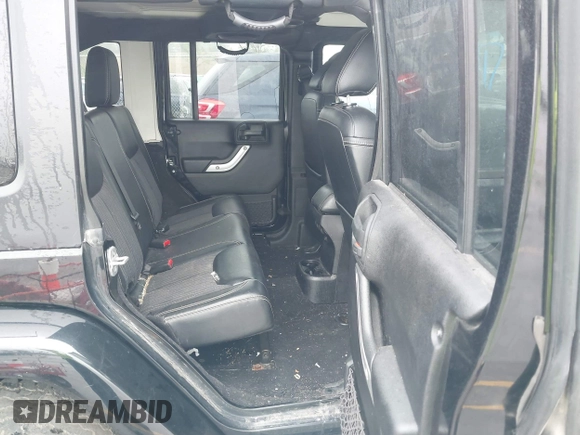 2013 Jeep Wrangler Unlimited Sport z VIN 1C4BJWDGXDL596450, wystawiony jako IAAI lot #42323862 z przebiegiem 114 105 mil mil oraz . Historia ofert i sprzedaży dostępna na DreamBid. Obrazek 8.