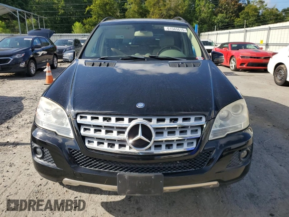 2011 Mercedes-Benz M 350 with VIN 4JGBB2FB5BA744077, listed as a Copart auction lot 61565615 with 125,813 mi miles and Salvage title. Bid and sale history available at DreamBid. Image 5.