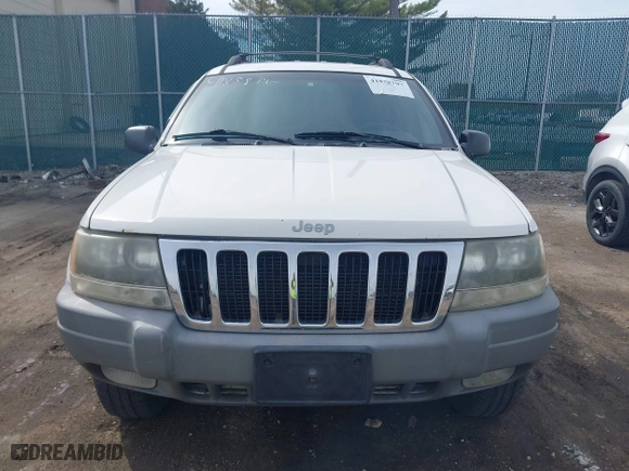 1999 Jeep Grand Cherokee Laredo with VIN 1J4GW58SXXC623404, listed as a IAAI auction lot 41838797 with 0 mi miles. Bid and sale history available at carsss.com. Image 6.