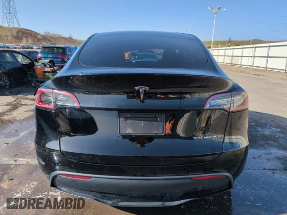 2023 Tesla Model Y Long Range with VIN 7SAYGDEE5PF850358, listed as a Copart auction lot 52581615 with 19,376 mi miles and Salvage Title. Bid and sale history available at DreamBid. Image 6.