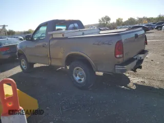 2001 Ford F-150 XL with VIN 1FTRF18W71NB69621, listed as a Copart auction lot 77816954 with Not provided miles and Salvage title. Bid and sale history available at DreamBid. Image 2.