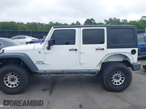 2018 Jeep Wrangler Unlimited Sport S with VIN 1C4BJWDG6JL818719, listed as a IAAI auction lot 42412991 with 58,399 mi miles and . Bid and sale history available at DreamBid. Image 14.