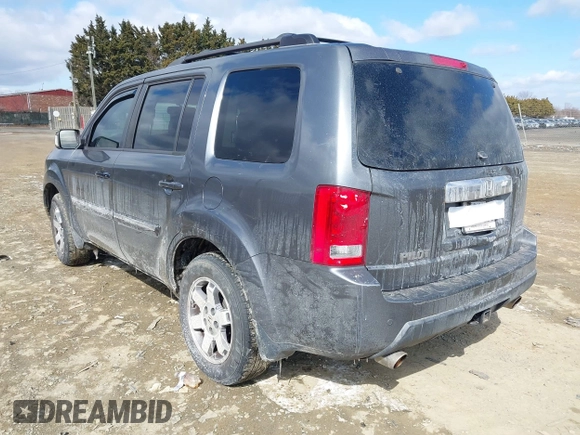 2011 Honda Pilot Touring with VIN 5FNYF4H98BB016012, listed as a IAAI auction lot 41634844 with 202,160 mi miles. Bid and sale history available at carsss.com. Image 3.