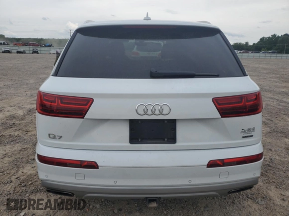 2018 Audi Q7 Premium Plus с VIN WA1LHAF73JD047088, выставлен на аукционе Copart как лот 58340075 с пробегом 56 240 миль миль и Списание • Salvage title. История ставок и продаж доступна на DreamBid. Изображение 6.