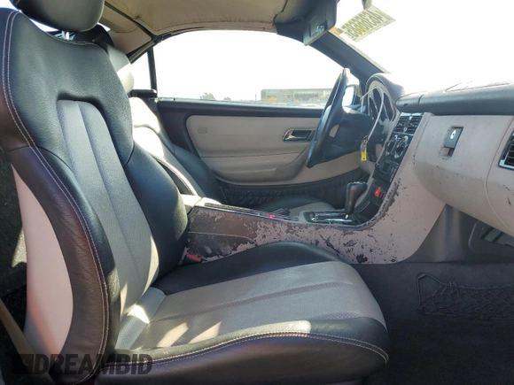 2000 Mercedes-Benz SLK 230 Kompressor with VIN WDBKK47F1YF164000, listed as a Copart auction lot 46366685 with 127,904 mi miles and Salvage title. Bid and sale history available at DreamBid. Image 10.