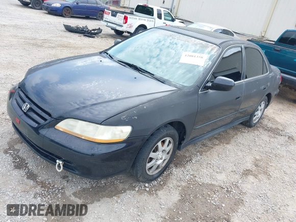 2002 Honda Accord SE z VIN 1HGCG668X2A171099, wystawiony jako IAAI lot #42081358 z przebiegiem 215 915 mil mil oraz . Historia ofert i sprzedaży dostępna na DreamBid. Obrazek 2.