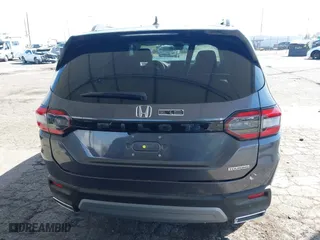 2025 Honda Pilot Touring with VIN 5FNYG2H73SB004351, listed as a IAAI auction lot 41699830 with 6,377 mi miles. Bid and sale history available at carsss.com. Image 16.