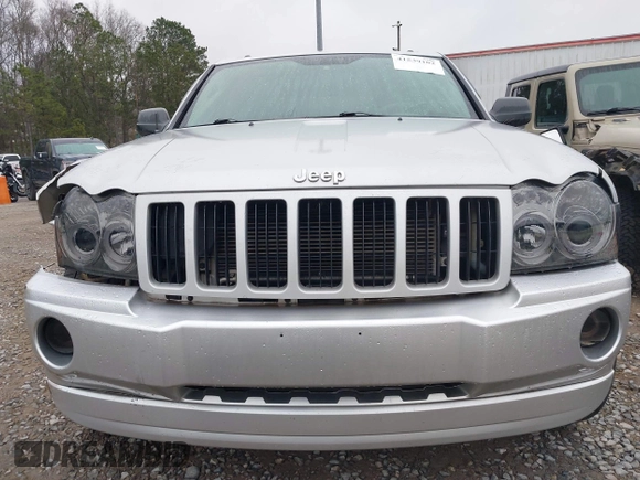 2005 Jeep Grand Cherokee Laredo z VIN 1J4GR48K05C506865, wystawiony jako IAAI lot #41539102 z przebiegiem 237 208 mil mil oraz . Historia ofert i sprzedaży dostępna na DreamBid. Obrazek 6.