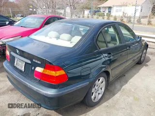 2004 BMW 3 Series 325i with VIN WBAET37424NJ96343, listed as a IAAI auction lot 41721056 with 186,848 mi miles. Bid and sale history available at carsss.com. Image 4.