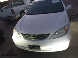 2004 Toyota Camry LE with VIN 4T1BF32K04U081583, listed as a IAAI auction lot 41139977 with 121,460 mi miles. Bid and sale history available at carsss.com. Image 12.