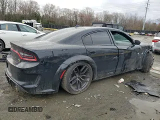 2021 Dodge Charger Scat Pack Widebody with VIN 2C3CDXGJ3MH620792, listed as a Copart auction lot 48355595 with 72,379 mi miles and Salvage Title. Bid and sale history available at carsss.com. Image 3.