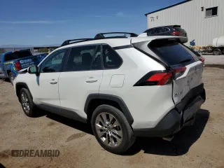 2021 Toyota RAV4 XLE Premium with VIN 2T3C1RFV0MW153089, listed as a Copart auction lot 60759615 with 28,153 mi miles and Salvage title. Bid and sale history available at DreamBid. Image 2.