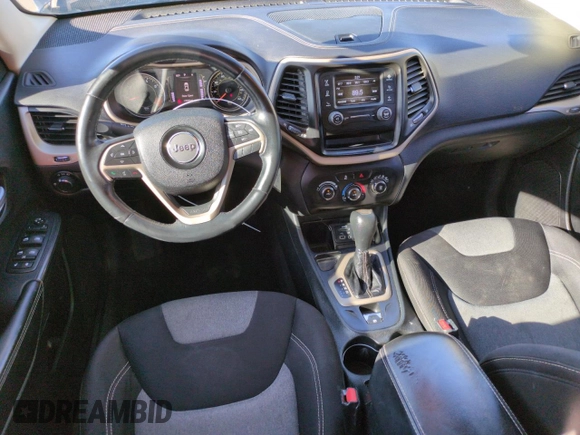 2015 Jeep Cherokee Sport z VIN 1C4PJLAB6FW689285, wystawiony jako Copart lot #54341465 z przebiegiem 114 293 mil mil oraz Szkoda całkowita • Salvage title. Historia ofert i sprzedaży dostępna na DreamBid. Obrazek 8.
