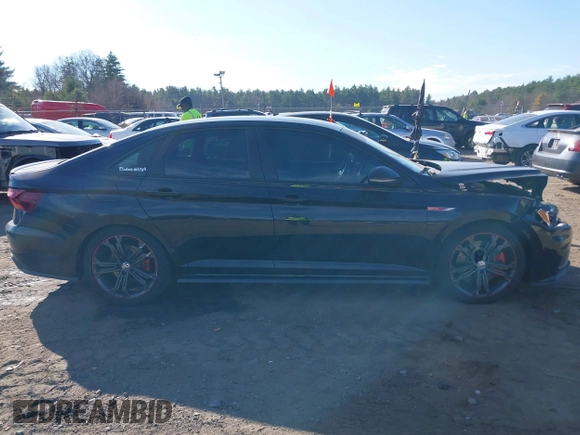 2019 Volkswagen Jetta GLI S z VIN 3VW5T7BU1KM156888, wystawiony jako IAAI lot #40778065 z przebiegiem 97 114 mil mil oraz . Historia ofert i sprzedaży dostępna na DreamBid. Obrazek 13.